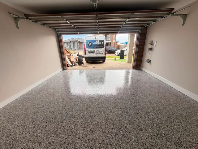 Epoxy alfresco floor — light grey flake finish