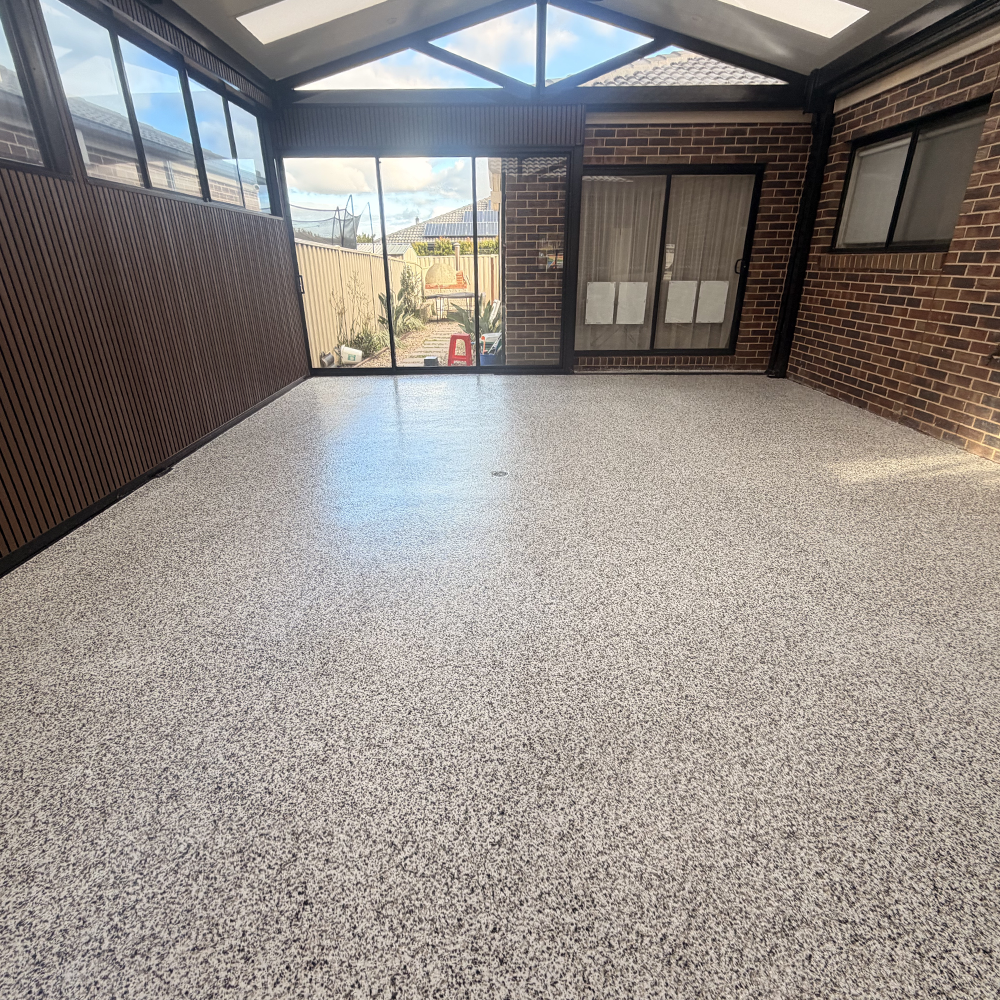 Epoxy alfresco floor — light grey flake finish